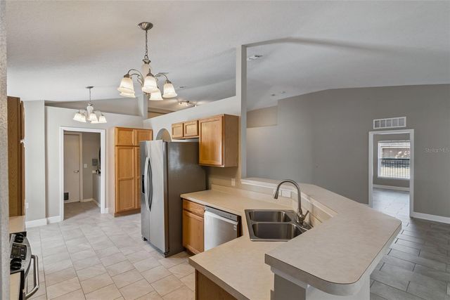 2242 AITKIN LOOP, Leesburg, FL 34748
