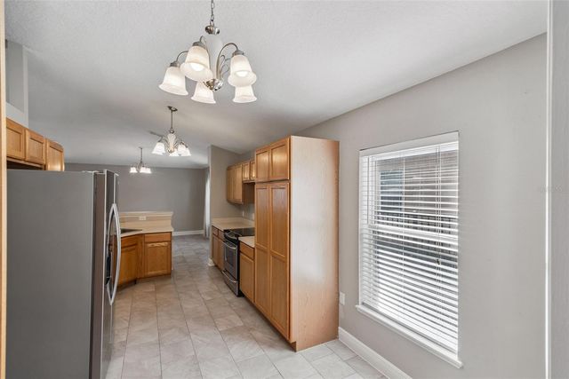 2242 AITKIN LOOP, Leesburg, FL 34748