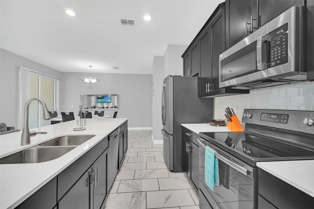 1569 PLUNKER DRIVE, Davenport, FL 33896