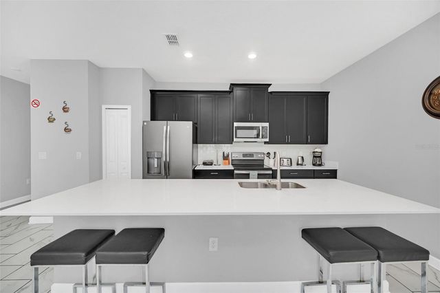 1569 PLUNKER DRIVE, Davenport, FL 33896