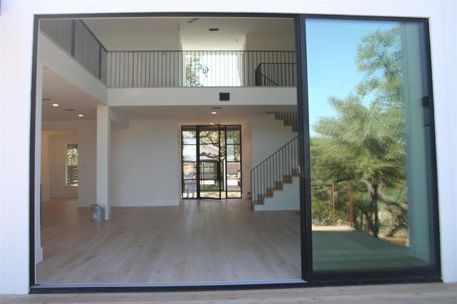 909 Cat Hollow Club DR, Spicewood, TX 78669