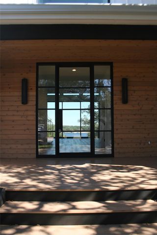 909 Cat Hollow Club DR, Spicewood, TX 78669