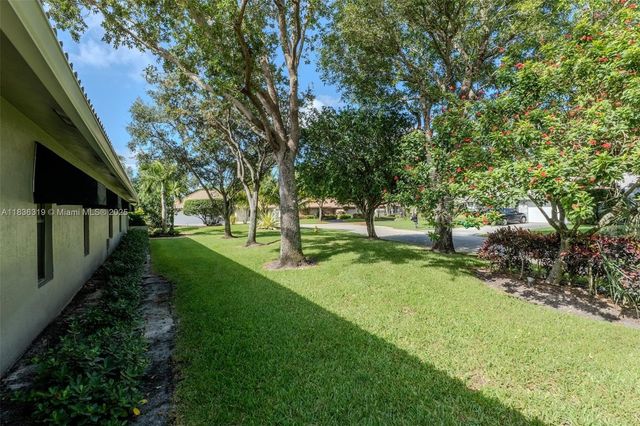 9099 NW 47th Ct, Coral Springs, FL 33067