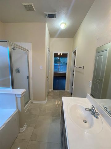 9210 Hidden Lake E, Magnolia, TX 77354