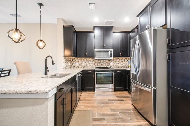 7573 LAUREATE BOULEVARD 1-305, Orlando, FL 32827