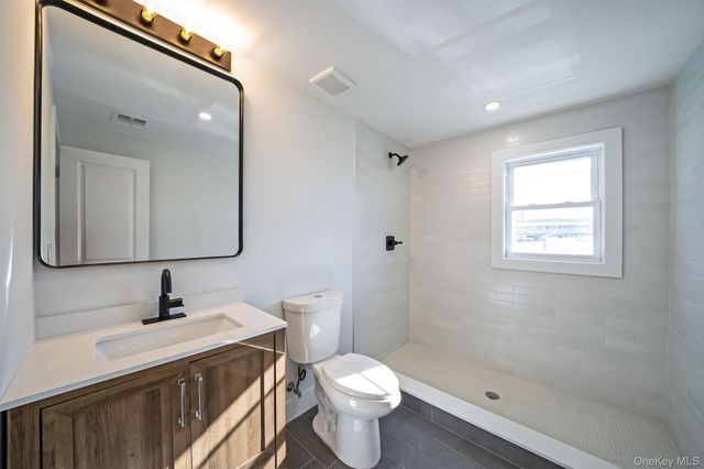 8 Rockaway Avenue, Westbury, NY 11590