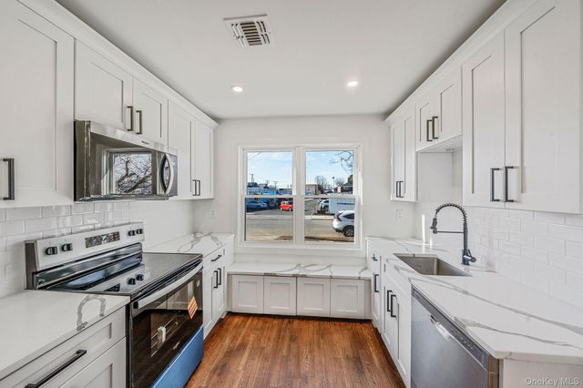 8 Rockaway Avenue, Westbury, NY 11590