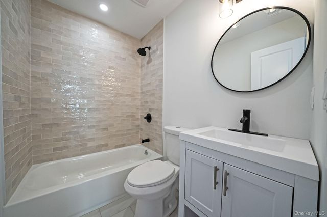 8 Rockaway Avenue, Westbury, NY 11590