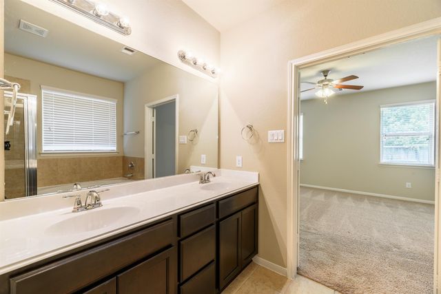 202 Black Swan Place, Magnolia, TX 77354