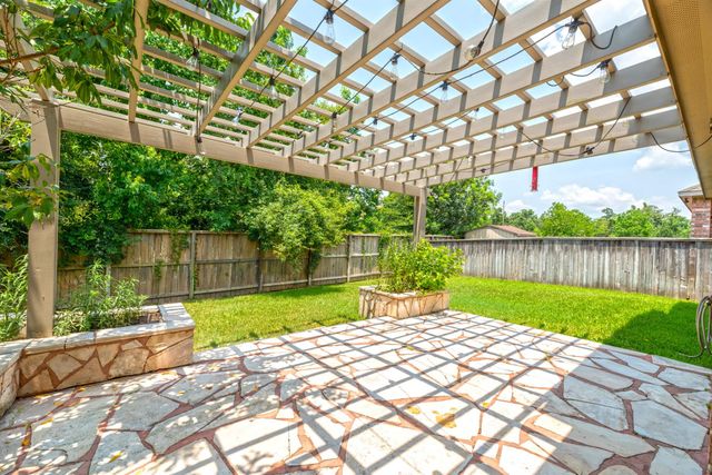 202 Black Swan Place, Magnolia, TX 77354