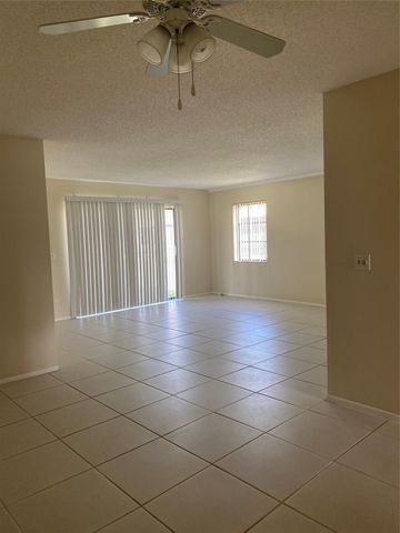 3340 BEAU RIVAGE Drive 104, Pompano Beach, FL 33064