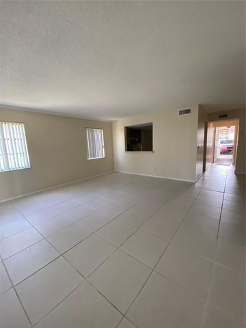 3340 BEAU RIVAGE Drive 104, Pompano Beach, FL 33064