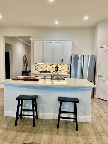 12106 Champions Forest Drive, Mont Belvieu, TX 77535