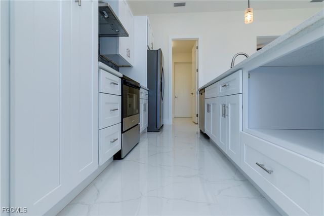 2124 NE 28th ST, Cape Coral, FL 33909