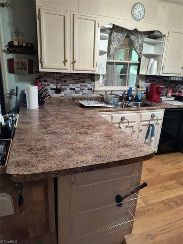 4917 Streamside Drive, Mcleansville, NC 27301