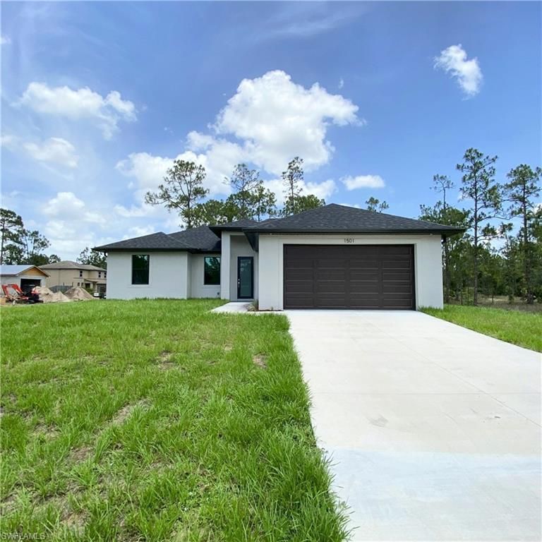 3121 32nd ST SW, LEHIGH ACRES, FL 33976 — exterior