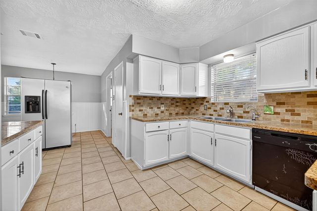 9602 S Petersham Drive, Houston, TX 77031