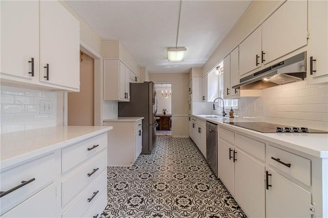 4424 Windsong Court SW, Lilburn, GA 30047