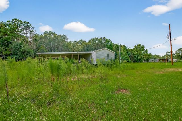 905 County Road 379, Cleveland, TX 77328