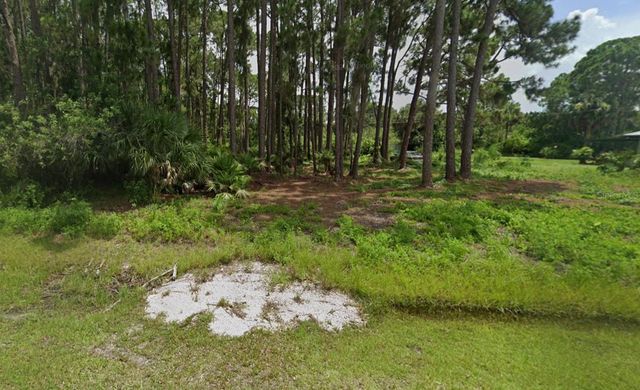 12203 CHAMBERLAIN BOULEVARD, Port Charlotte, FL 33953