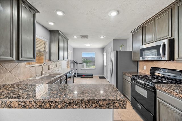 10902 Tobar Falls Circle, Houston, TX 77064