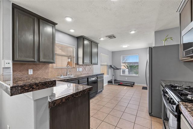 10902 Tobar Falls Circle, Houston, TX 77064