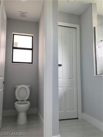 3303 16th ST SW, Lehigh Acres, FL 33976