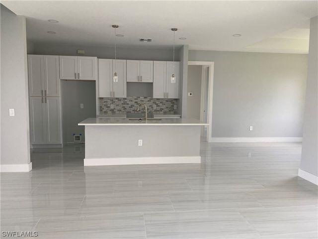 3303 16th ST SW, Lehigh Acres, FL 33976