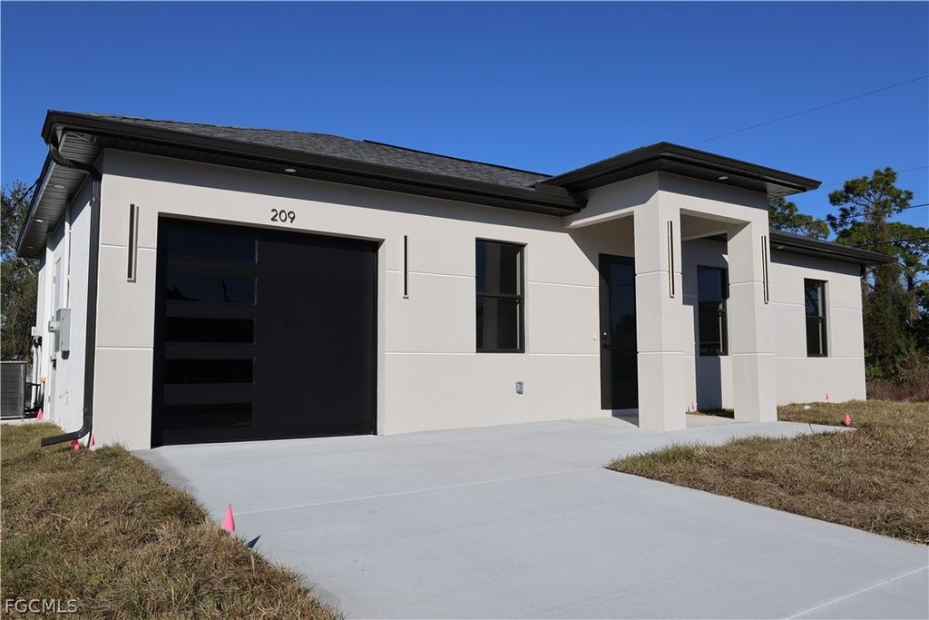 209 Irving AVE N, Lehigh Acres, FL 33971