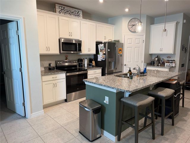 396 HELMSMAN AVENUE, Mascotte, FL 34753