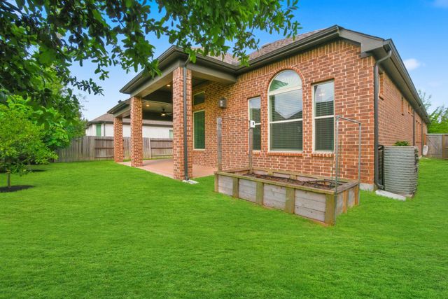 406 Boggy Belt Lane, Conroe, TX 77304