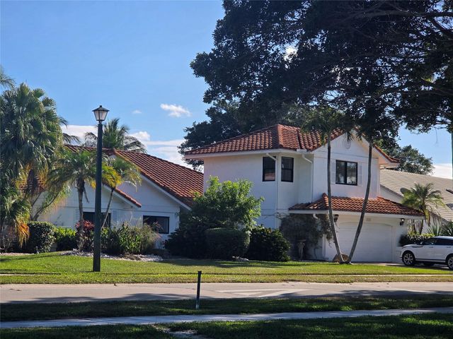 10486 Boca Woods Lane, Boca Raton, FL 33428