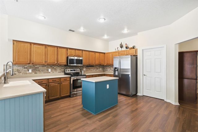 1212 NEEDLEWOOD LOOP, Oviedo, FL 32765