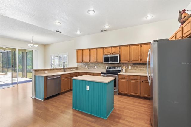 1212 NEEDLEWOOD LOOP, Oviedo, FL 32765