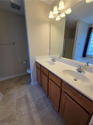 7312 Scenic Village Lane, Whitsett, NC 27377