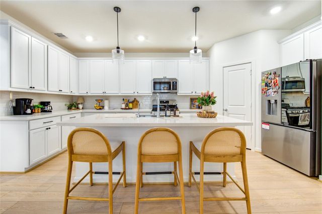 9727 Arrigoni Creek Drive, Cypress, TX 77433