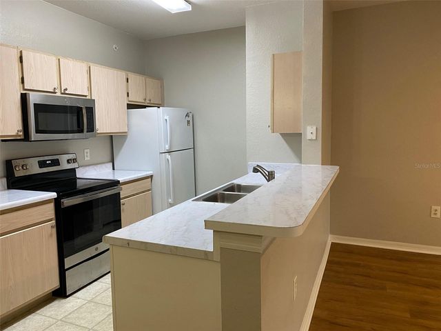 5447 VINELAND ROAD 1303, Orlando, FL 32811