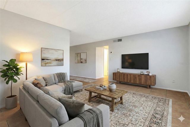 1902 HONOUR ROAD 11, Orlando, FL 32839