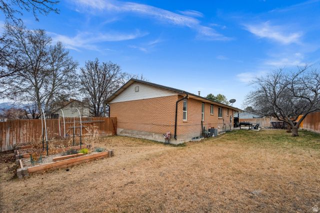 7106 S ANGELSEA DR, West Jordan, UT 84084