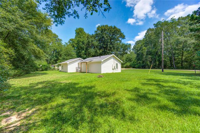 411 Waterfall Drive, Huffman, TX 77336