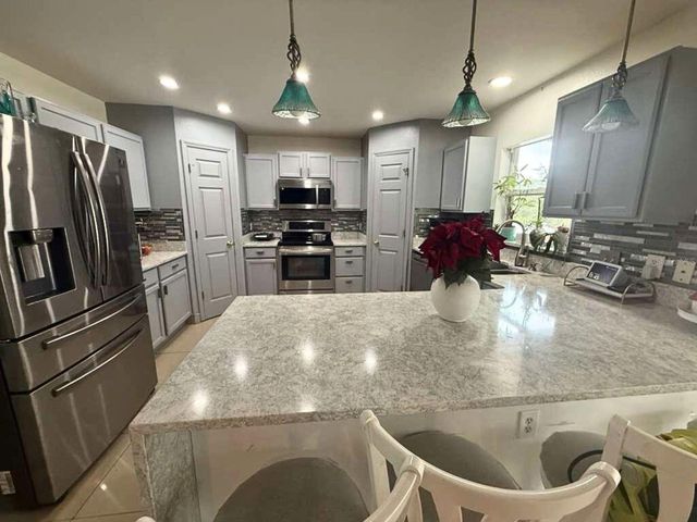 1945 MYAKKA COURT, Poinciana, FL 34759