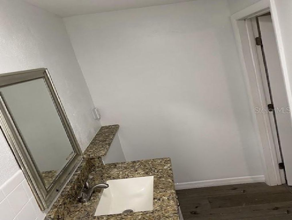 Image 14 of property listing at 8911 N WILLOW AVENUE, Tampa, FL 33604