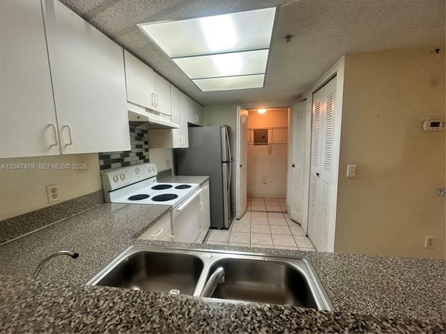 5011 Wiles Rd 207, Coconut Creek, FL 33073