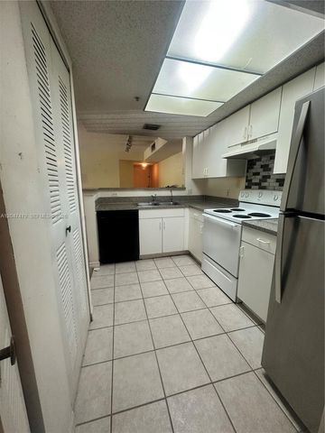 5011 Wiles Rd 207, Coconut Creek, FL 33073