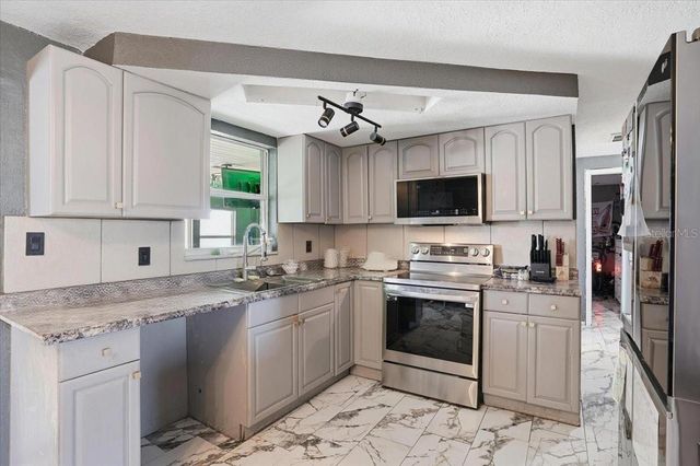 3208 KILBURN ROAD, Holiday, FL 34691