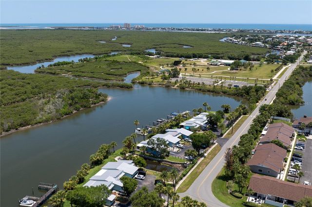 100 POINCIANA COVE COURT 100, New Smyrna Beach, FL 32169