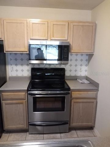 8939 LATREC AVENUE 1203, Orlando, FL 32819