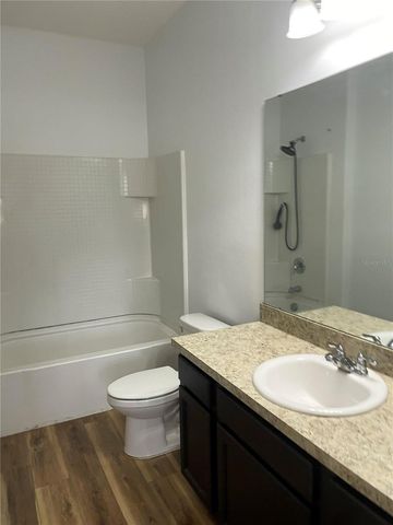 15725 PINE SISKIN LOOP, Mascotte, FL 34753