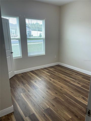 15725 PINE SISKIN LOOP, Mascotte, FL 34753