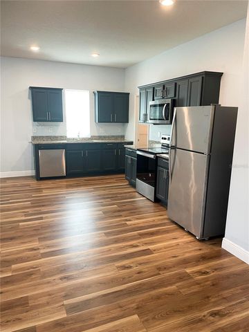15725 PINE SISKIN LOOP, Mascotte, FL 34753